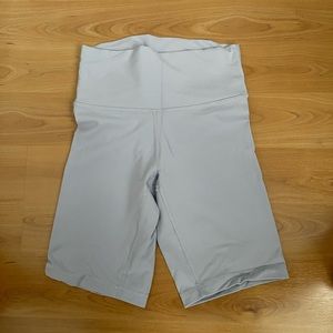 TNA butter atmosphere high rise 9” biker short in lilac